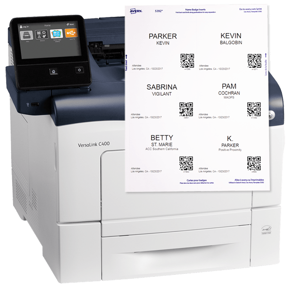 Example of a laser printer and sheet on top with print-out of badges